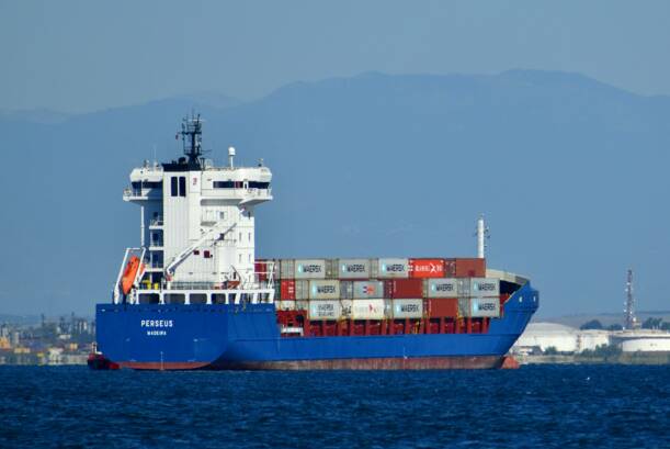 a boat entering an harbor