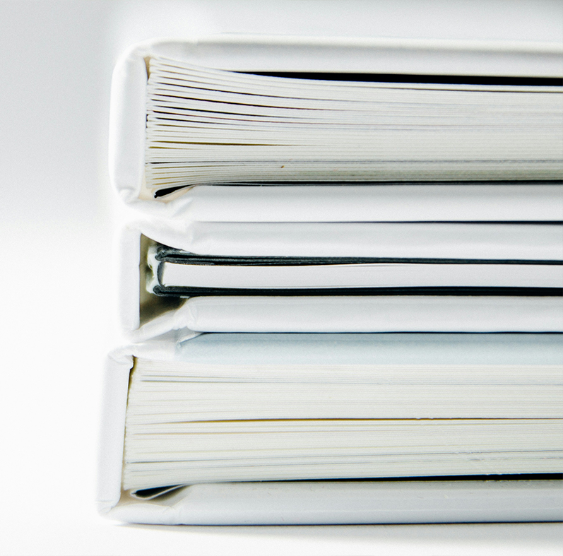 A Stack of Documents against White Background
